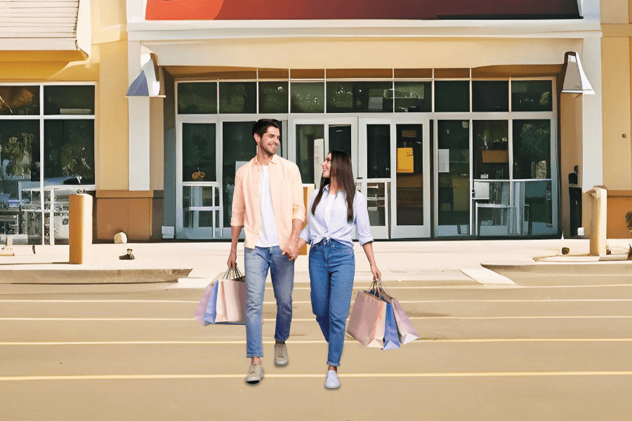 Couple walking with shopping bags